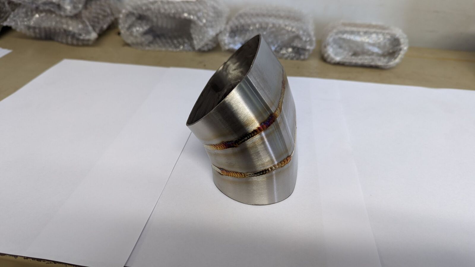 Vibrant Horizontal 304 SS Oval Pie Cuts 4.0in OD Tight 45 Degree Elbow - Bag of 3 main image 0
